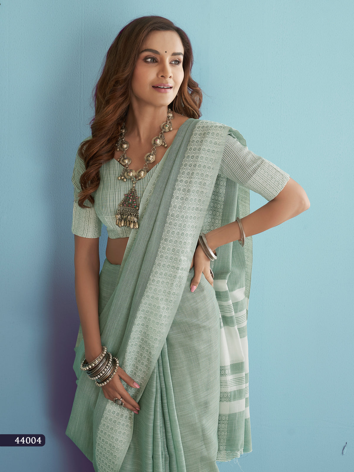 Sage Green Soft Linen Silk Saree with Chikankari Woven Border
