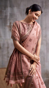 Peach Modal Cotton Saree with Floral Motifs & Traditional Tassel Pallu