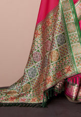 Rani Pink Patola Silk Saree with Traditional Floral Border & Multicolour Tassel Pallu