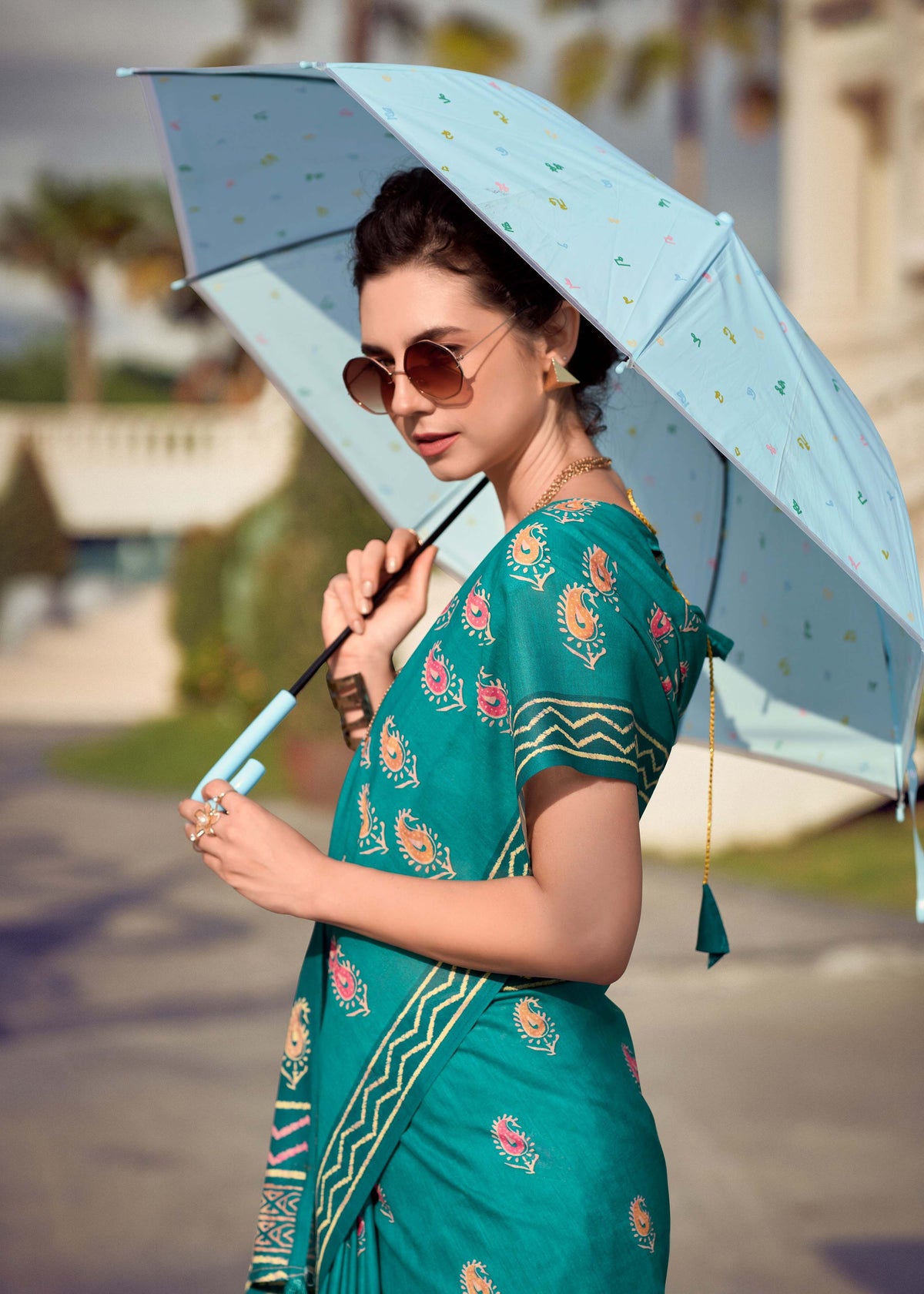 Teal Blue Mul Silk Saree with Paisley Motifs & Artistic Geometric Pallu