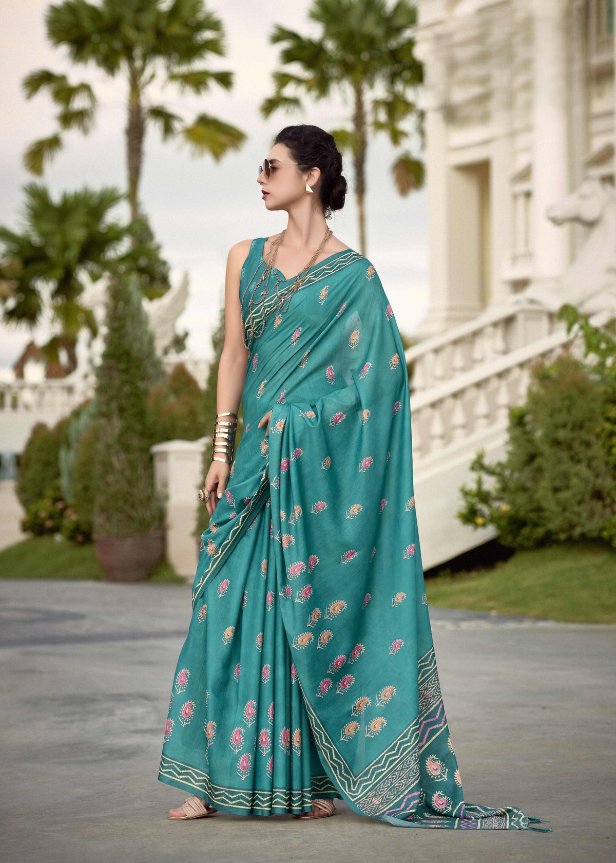 Teal Blue Mul Silk Saree with Paisley Motifs & Artistic Geometric Pallu