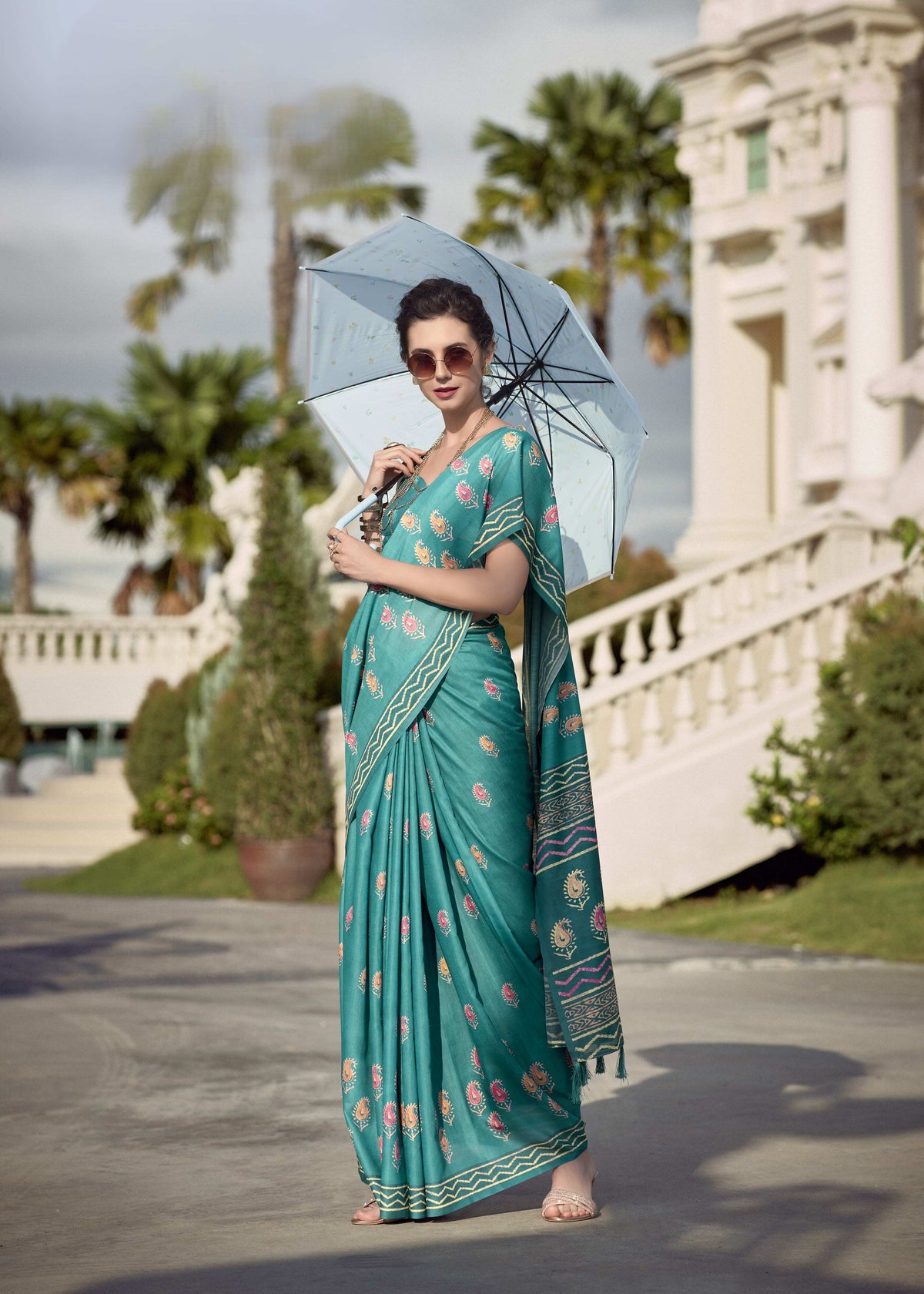 Teal Blue Mul Silk Saree with Paisley Motifs & Artistic Geometric Pallu