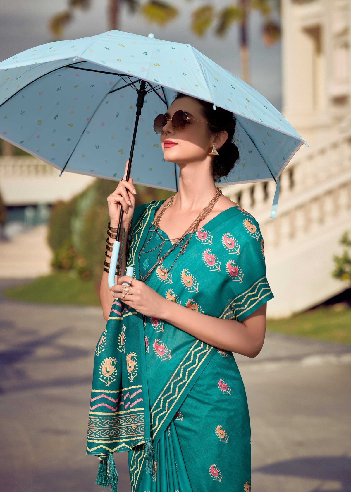 Teal Blue Mul Silk Saree with Paisley Motifs & Artistic Geometric Pallu