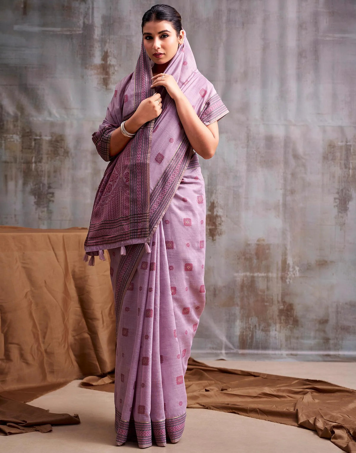 Mauve Modal Cotton Saree with Floral Motifs & Traditional Tassel Pallu