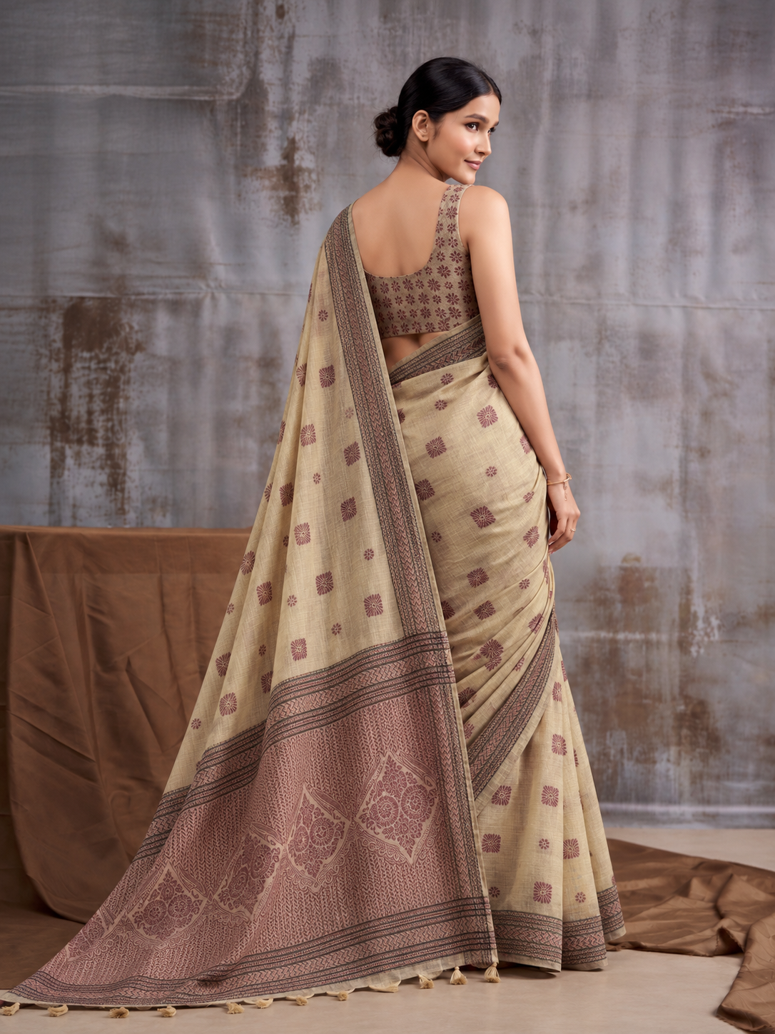 Classic Beige Modal Cotton Saree with Floral Motifs & Intricate Tassel Pallu