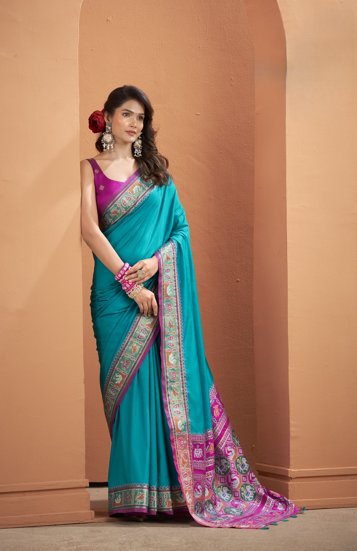 Teal Blue Patola Silk Saree with Multicolour Woven Border