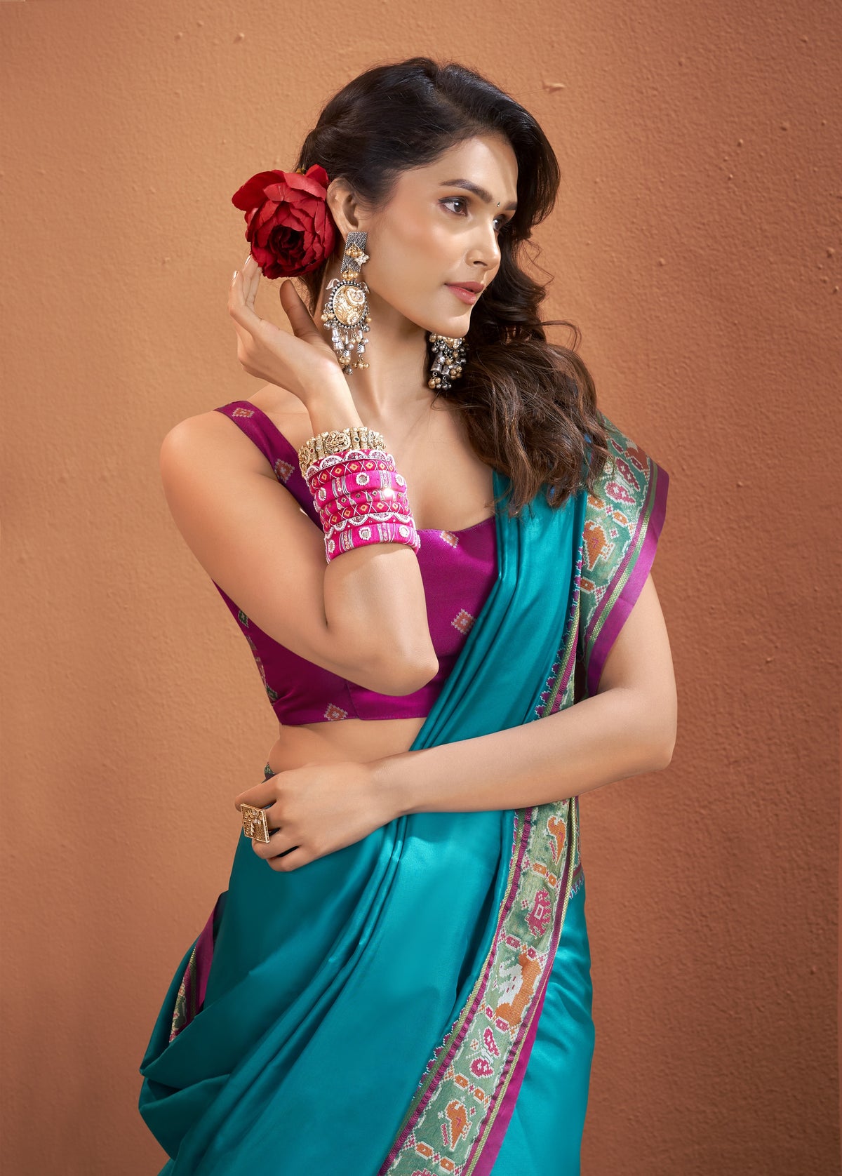 Teal Blue Patola Silk Saree with Multicolour Woven Border