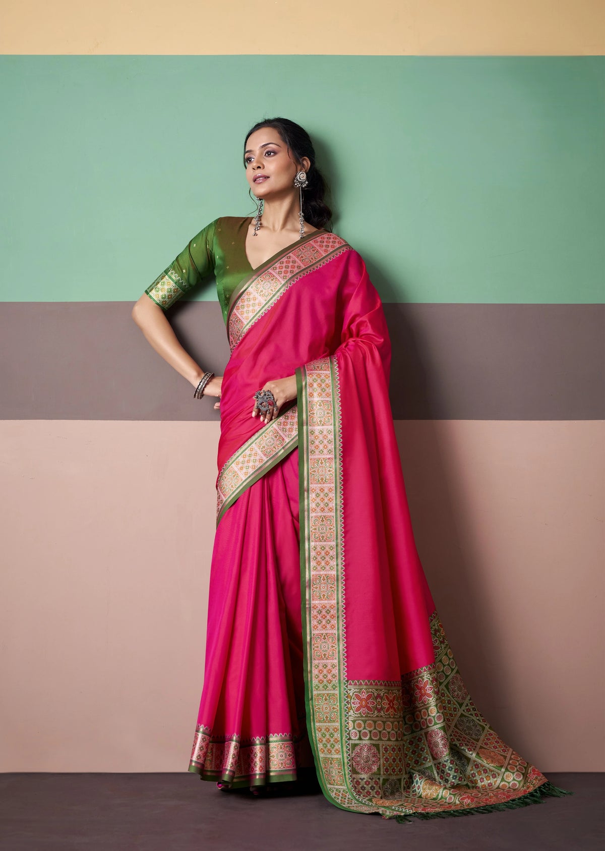 Rani Pink Patola Silk Saree with Traditional Floral Border & Multicolour Tassel Pallu