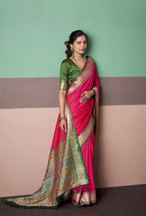 Rani Pink Patola Silk Saree with Traditional Floral Border & Multicolour Tassel Pallu
