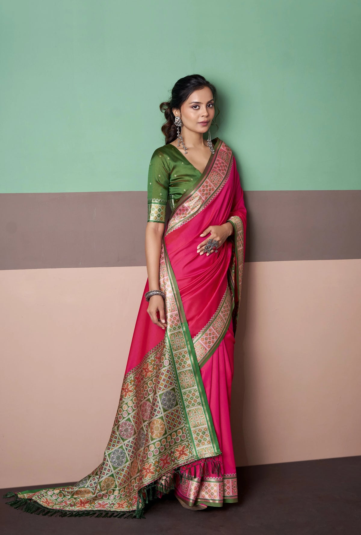Rani Pink Patola Silk Saree with Traditional Floral Border & Multicolour Tassel Pallu