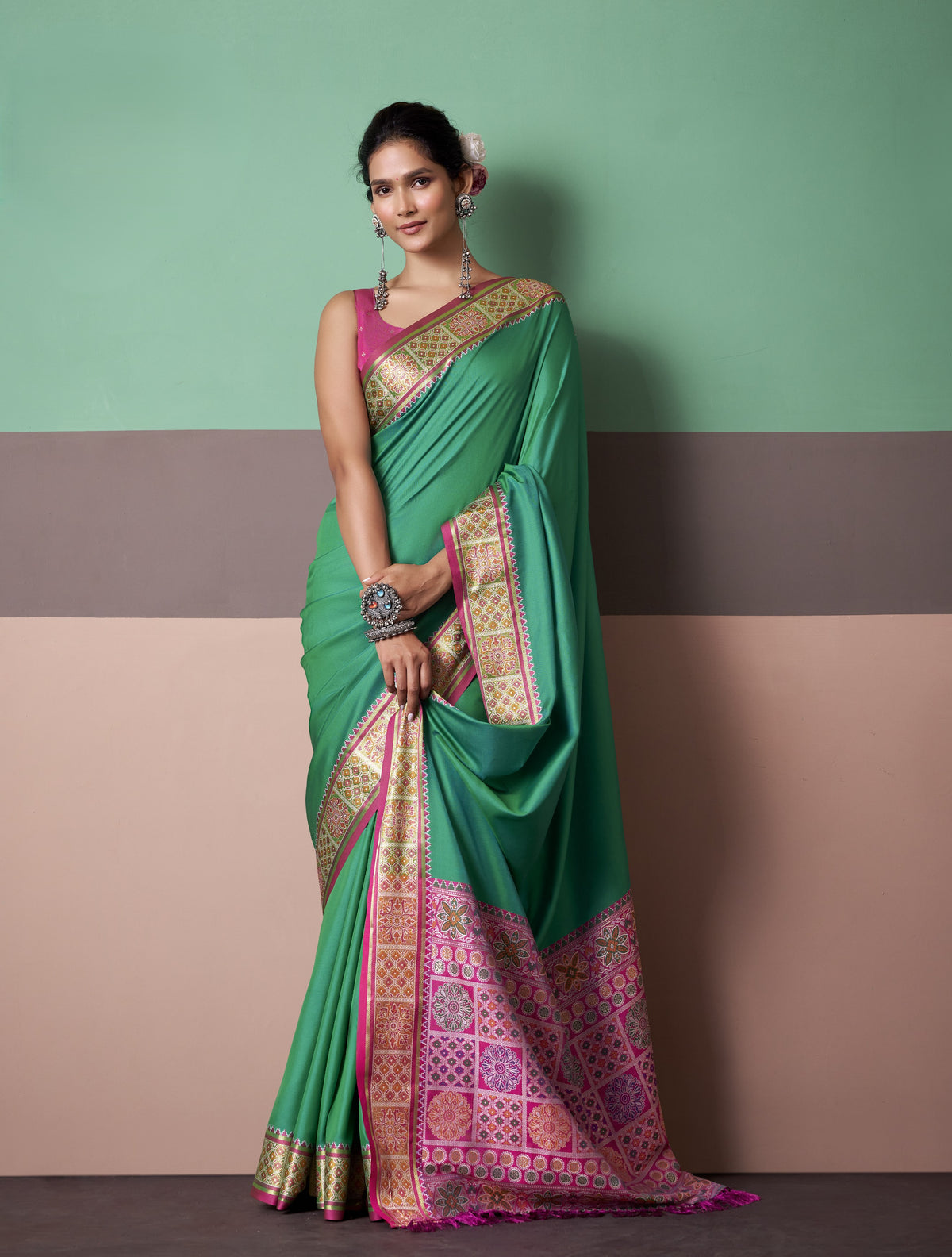 Emerald Green Patola Silk Saree with Traditional Tassel Pallu