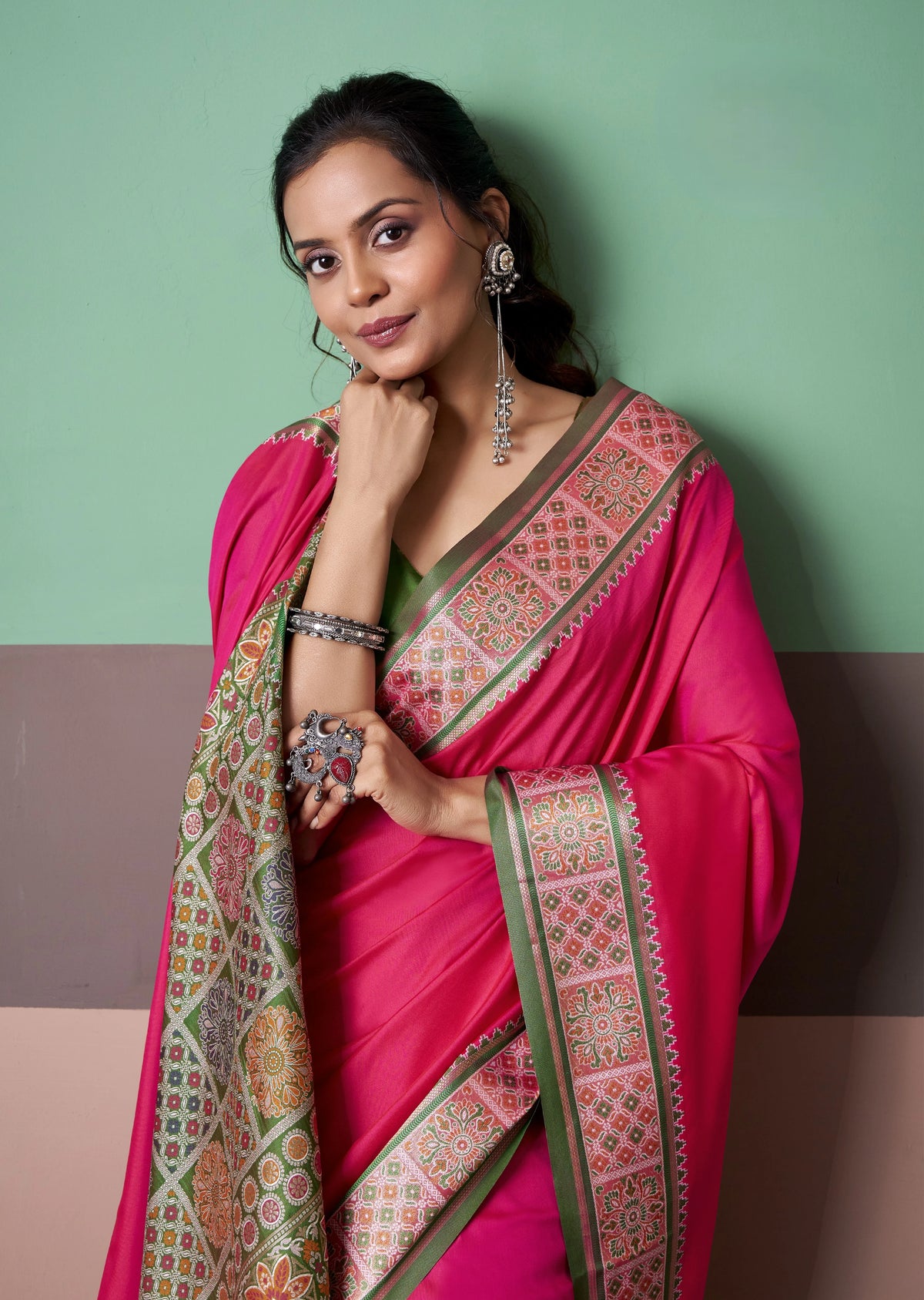 Rani Pink Patola Silk Saree with Traditional Floral Border & Multicolour Tassel Pallu