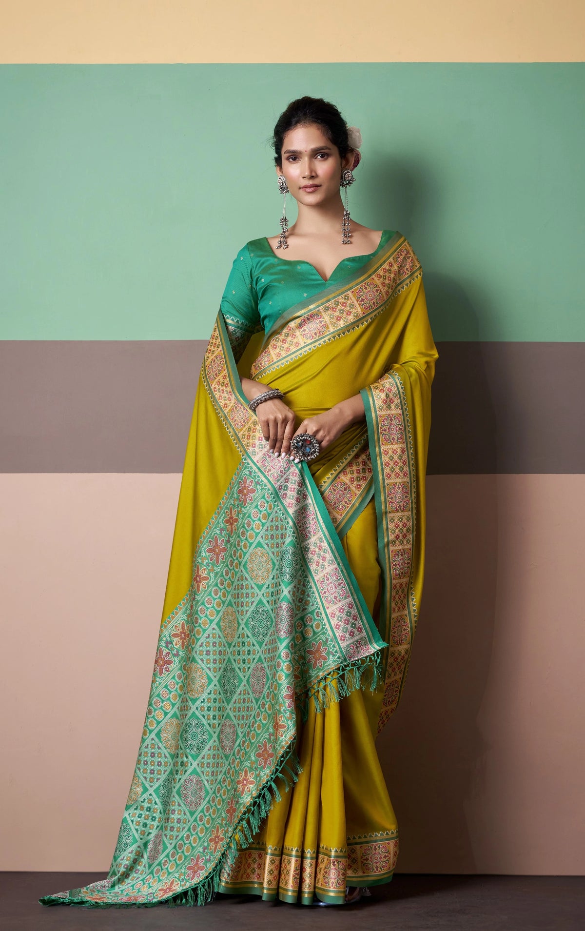Mustard Yellow Patola Silk Saree with Traditional Floral Border