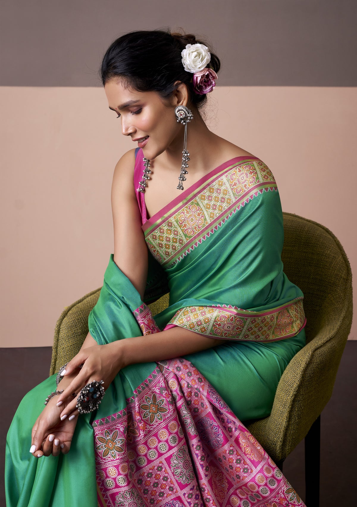 Emerald Green Patola Silk Saree with Traditional Tassel Pallu