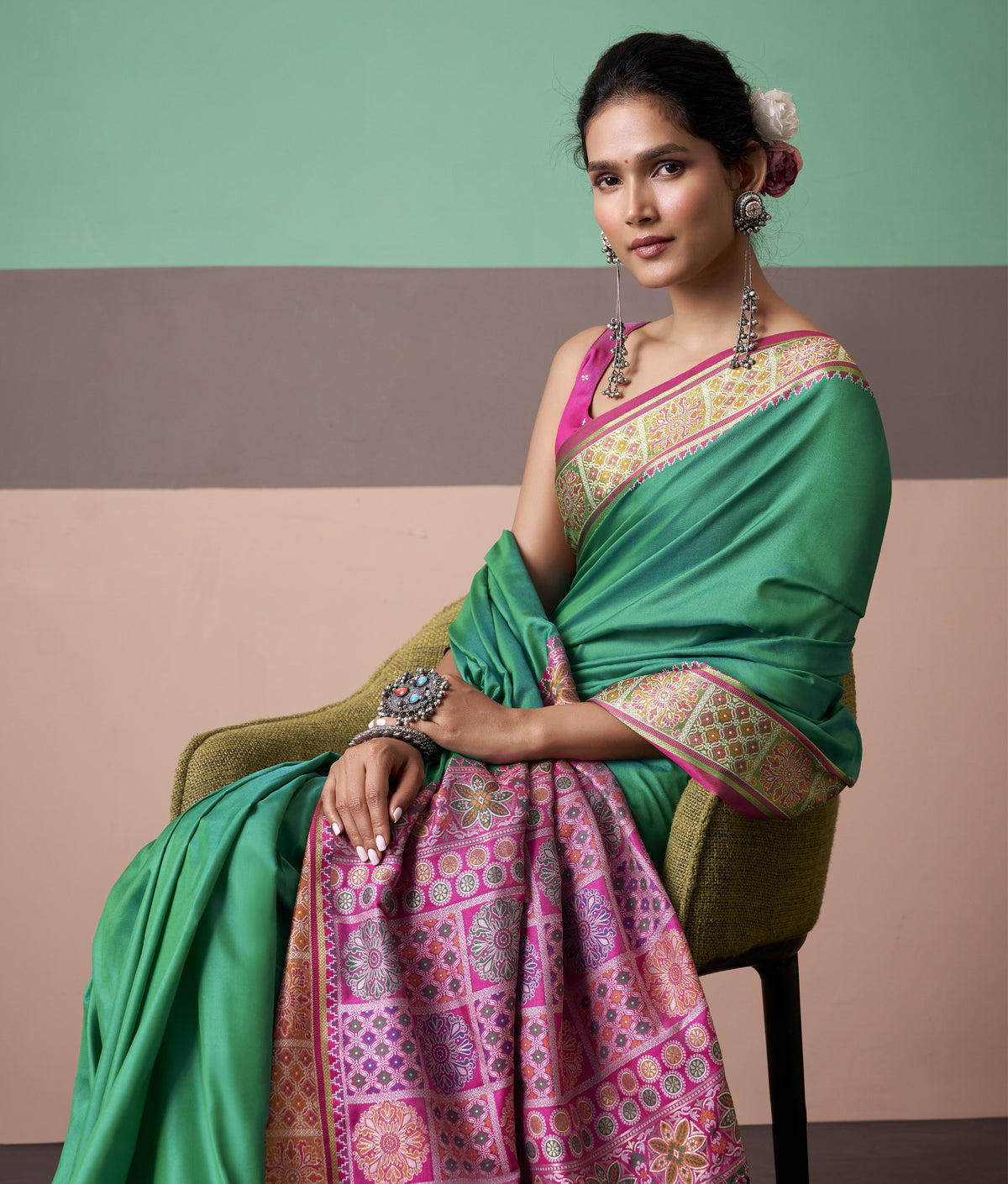 Emerald Green Patola Silk Saree with Traditional Tassel Pallu