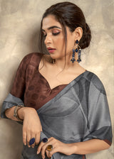 Smoky Grey Satin Silk Saree with Abstract Print & Contrast Brown Border