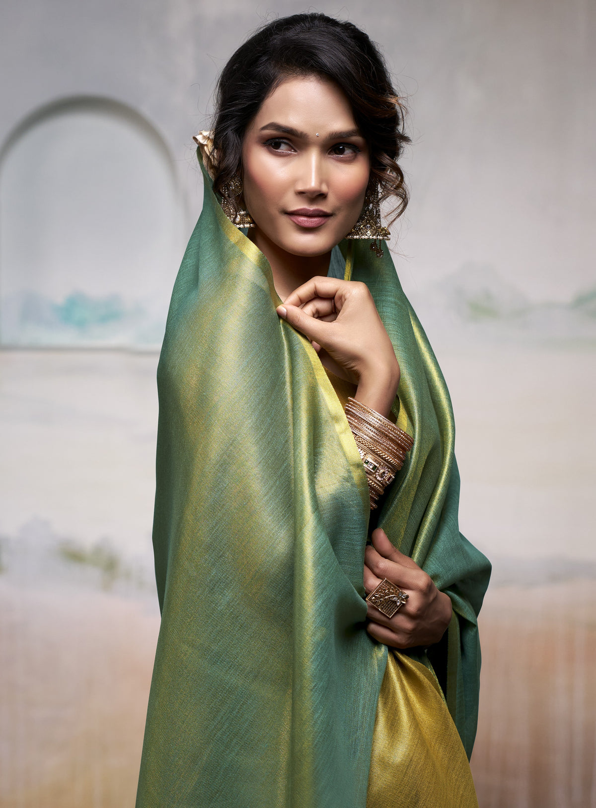 Emerald Green Pure Handloom Tissue Saree with Antique Gold Border