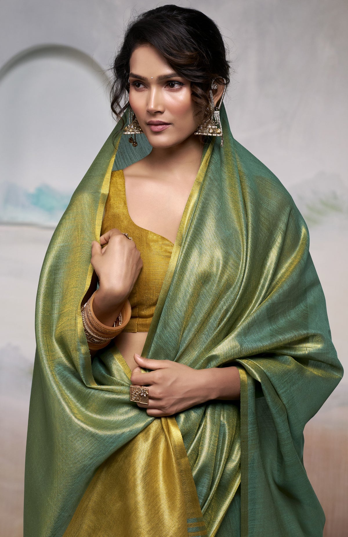 Emerald Green Pure Handloom Tissue Saree with Antique Gold Border