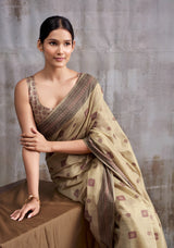 Classic Beige Modal Cotton Saree with Floral Motifs & Intricate Tassel Pallu